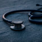 AI Is Already Inside the Doctor's Visit. The Question Is Whether It's Helping or Hunting for Billable Findings.